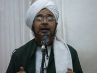 حكمة إشهار اسمي الحق ورسوله وارتباطها بالإيمان